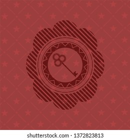 key icon inside vintage red emblem