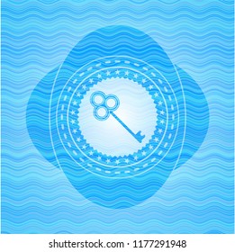 key icon inside water concept emblem.