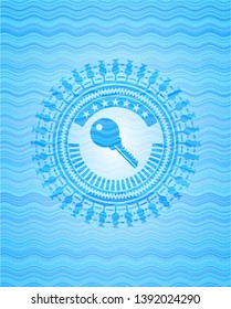 key icon inside water concept badge background.