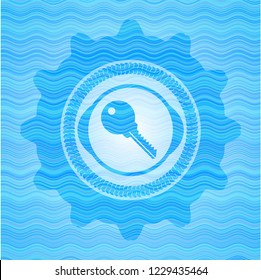 key icon inside water representation emblem background.