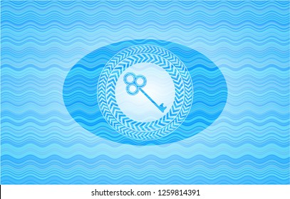 key icon inside water wave emblem.