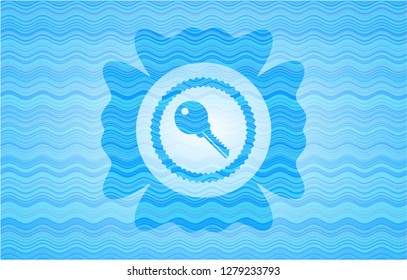 key icon inside water wave concept badge background.