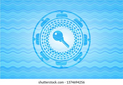 key icon inside water wave emblem.