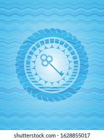 key icon inside water wave concept emblem background.