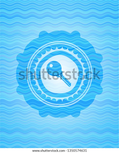 key icon inside water wave\
emblem.