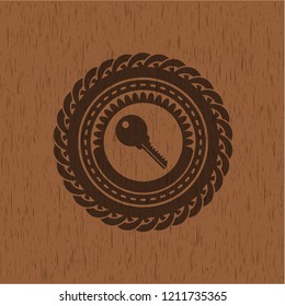 key icon inside wood emblem. Retro