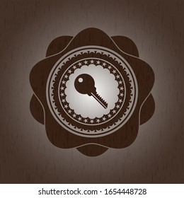 key icon inside wood emblem. Retro
