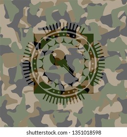 key icon on camouflage pattern
