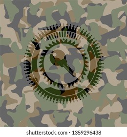 key icon on camouflage texture