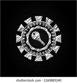 key icon on chalkboard