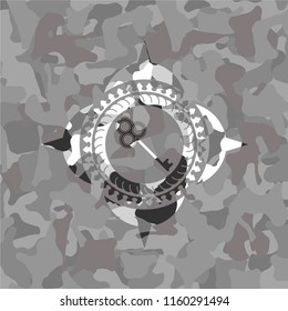key icon on grey camo texture