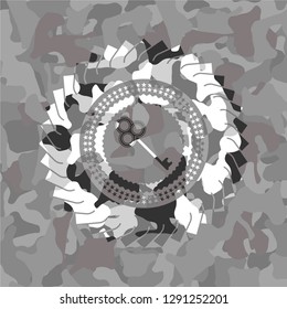 key icon on grey camo texture