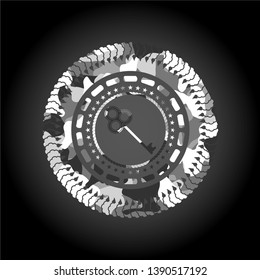 key icon on grey camouflage pattern