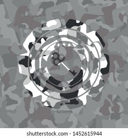 key icon on grey camouflaged pattern
