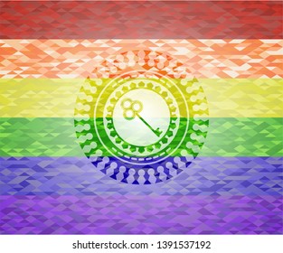 key icon on mosaic background with the colors of the LGBT flag
