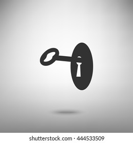 Key in keyhole sign. Dark gray icon with shadow on floor.