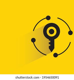 key with shadow on yellow background