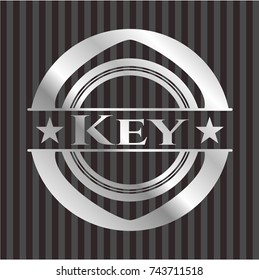 Key silvery shiny emblem