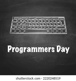 keyboard drawn with chalk on a blackboard and an inscription "programmers day“.
