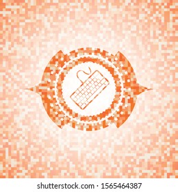 keyboard icon inside abstract emblem, orange mosaic background