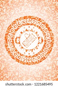 keyboard icon inside abstract orange mosaic emblem with background