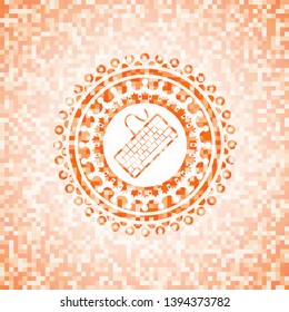 keyboard icon inside abstract orange mosaic emblem