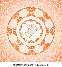keyboard icon inside abstract orange mosaic emblem
