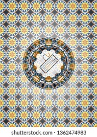 keyboard icon inside arabic style badge. Arabesque decoration.