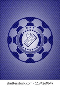 keyboard icon inside badge with jean texture