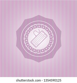keyboard icon inside badge with pink background