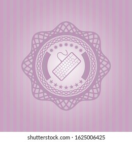 keyboard icon inside badge with pink background