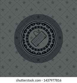 keyboard icon inside black emblem