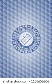 keyboard icon inside blue badge with geometric pattern.