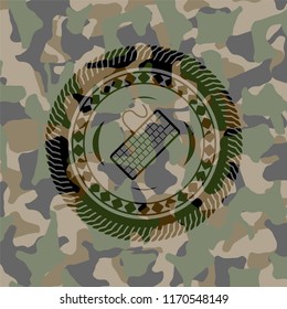 keyboard icon inside camouflage emblem