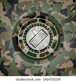 keyboard icon inside camouflaged emblem