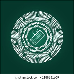 keyboard icon inside chalk emblem written on a blackboard