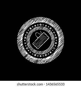 keyboard icon inside chalk emblem written on a blackboard