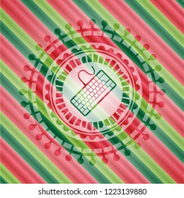 keyboard icon inside christmas badge background.