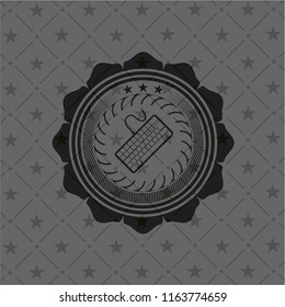 keyboard icon inside dark badge or emblem