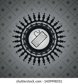 keyboard icon inside dark emblem