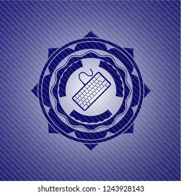 keyboard icon inside denim background