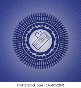 keyboard icon inside denim background