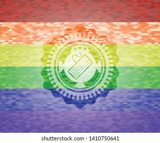 keyboard icon inside emblem on mosaic background with the colors of the LGBT flag