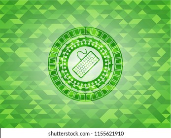 keyboard icon inside green emblem with mosaic background