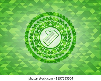 keyboard icon inside green emblem with triangle mosaic background