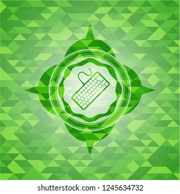 keyboard icon inside green emblem with mosaic background