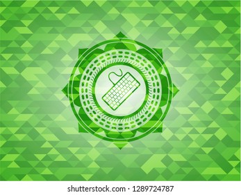 keyboard icon inside green mosaic emblem