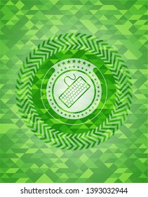 keyboard icon inside green mosaic emblem