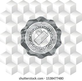 keyboard icon inside grey badge with geometric cube white background