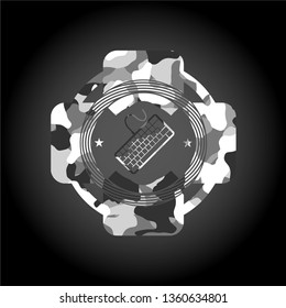 keyboard icon inside grey camo emblem
